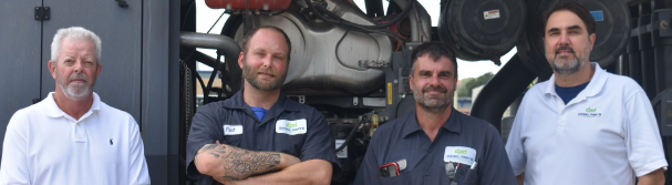 Photo of our service team including factory trained mechanics